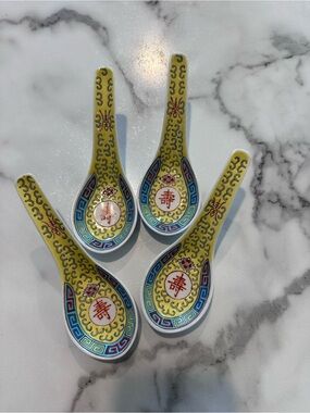 Four vintage yellow Chinese Mun Shou longevity porcelain soup spoons